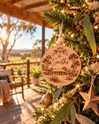 Engraved wooden ornament on a Christmas tree on a country verandah